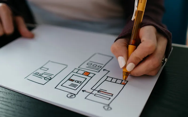 Web designer working on laptop screen